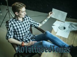 A0TattooedTomas